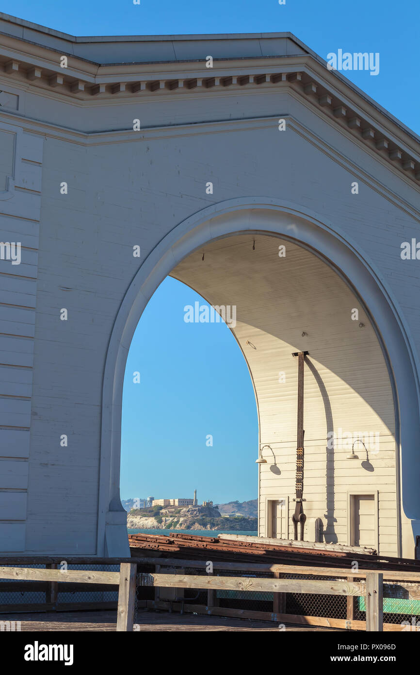 View of the Alcatraz Island through the Old Port Gate at Fisherman's Wharf, San Francisco,California, United States Stock Photo