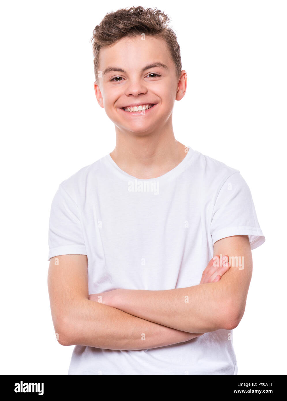Half-length emotional portrait of caucasian teen boy wearing white t-shirt.  Funny teenager with arms folded, isolated on white background. Handsome ch  Stock Photo - Alamy