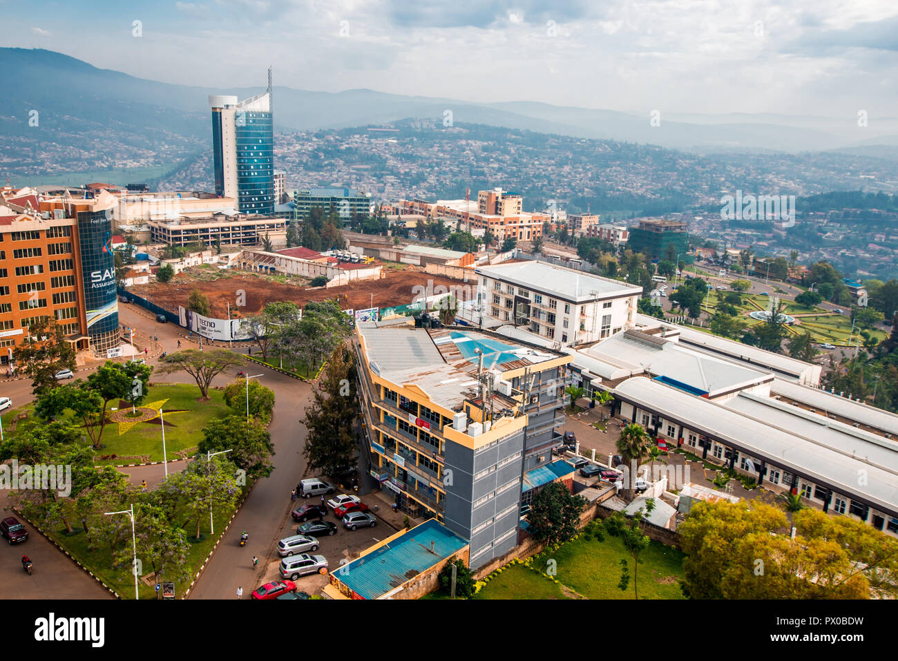 Kigali, Rwanda - September 21, 2018: a wide panoramic view looking down on the city centre with Kigali City Tower against the backdrop of distant blue Stock Photo