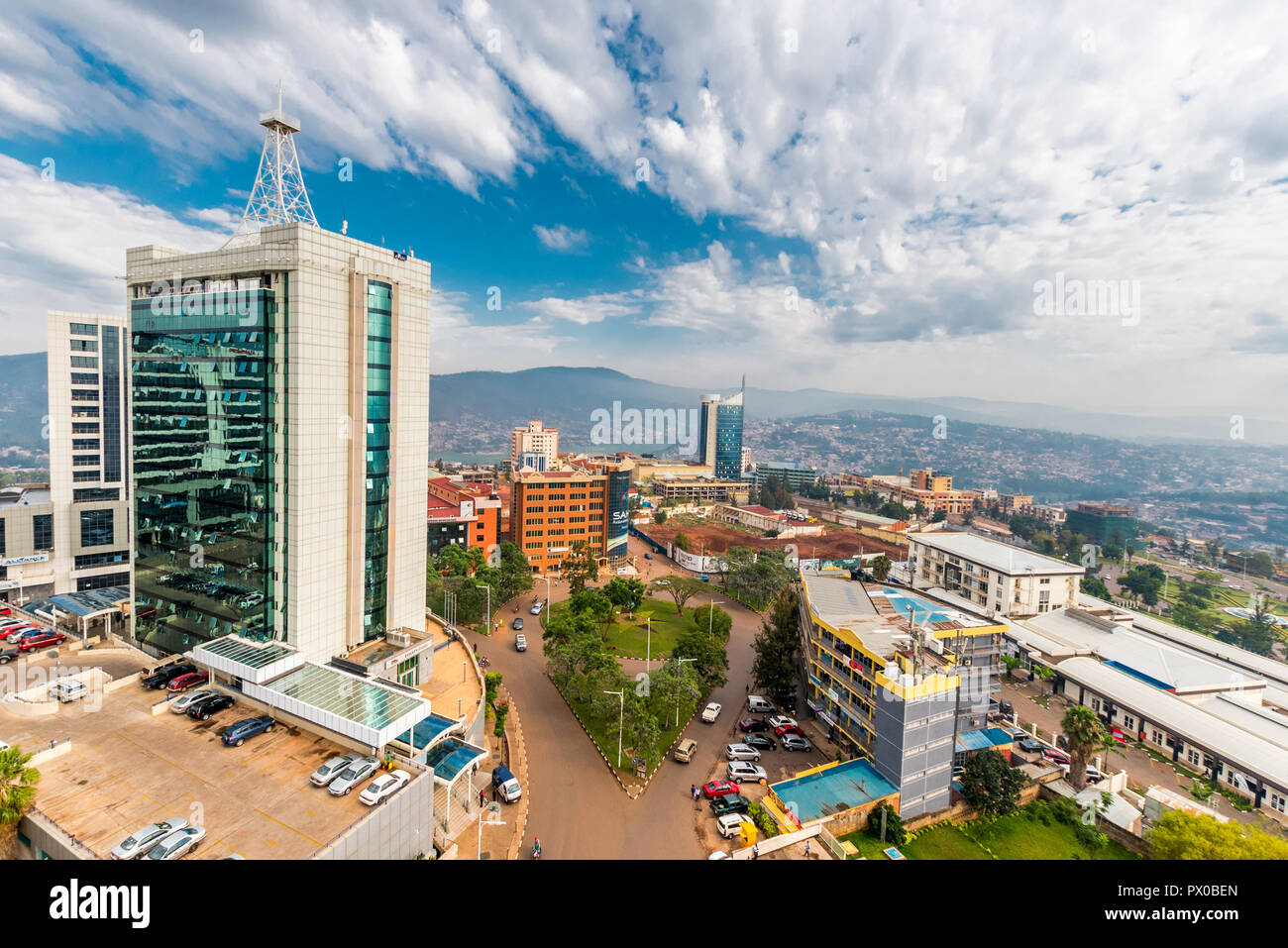Kigali, Rwanda - September 21, 2018: a wide view looking down on the city centre with Pension Plaza looming in the foreground and Kigali City Tower in Stock Photo