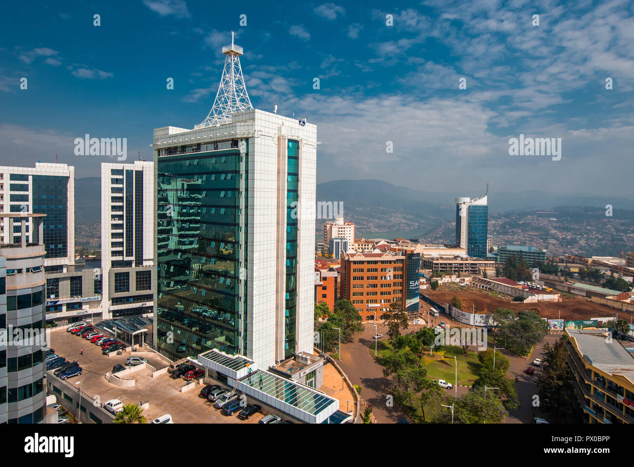 Kigali, Rwanda - September 21, 2018: a wide view looking down on the city centre with Pension Plaza looming in the foreground and Kigali City Tower in Stock Photo