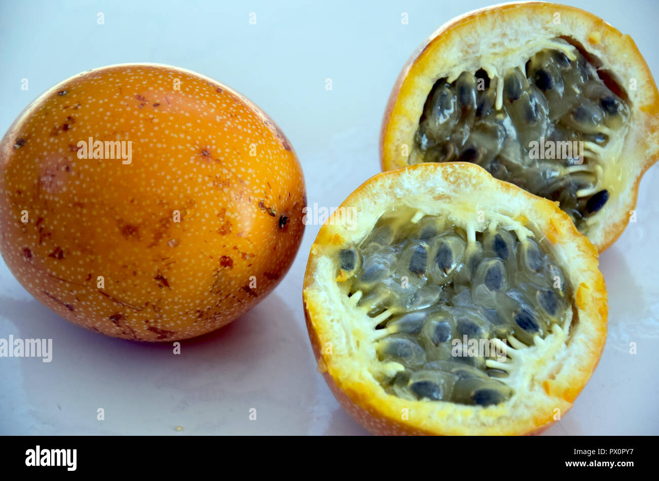 Granadilla or Passion Fruit on the table Stock Photo Alamy