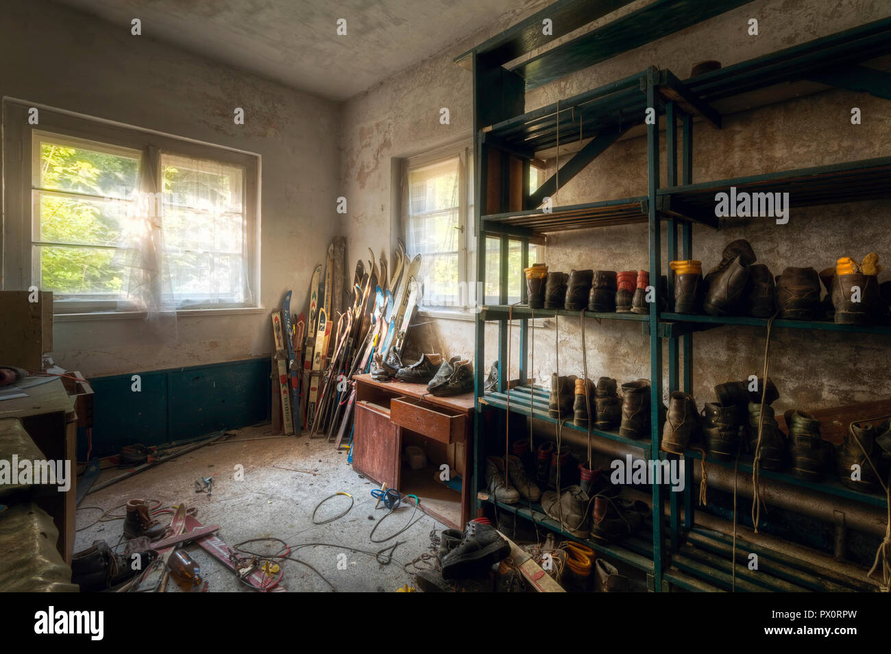 Interior view of the ski storage in an abandoned hotel in Germany. Stock Photo