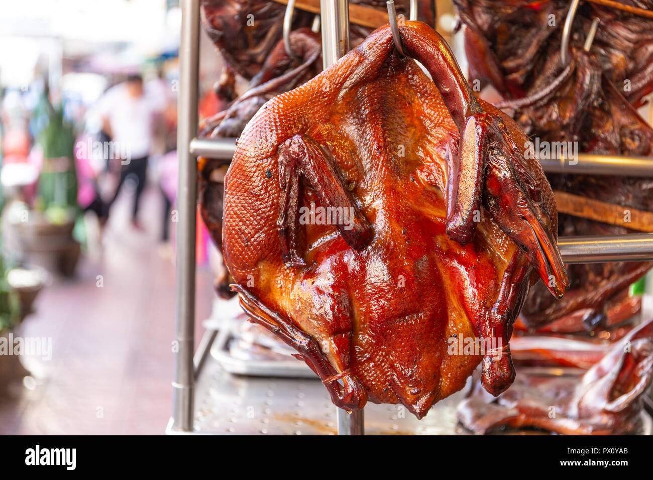 The Hanging roasted duck, Smoked duck. Street food in Bangkok's