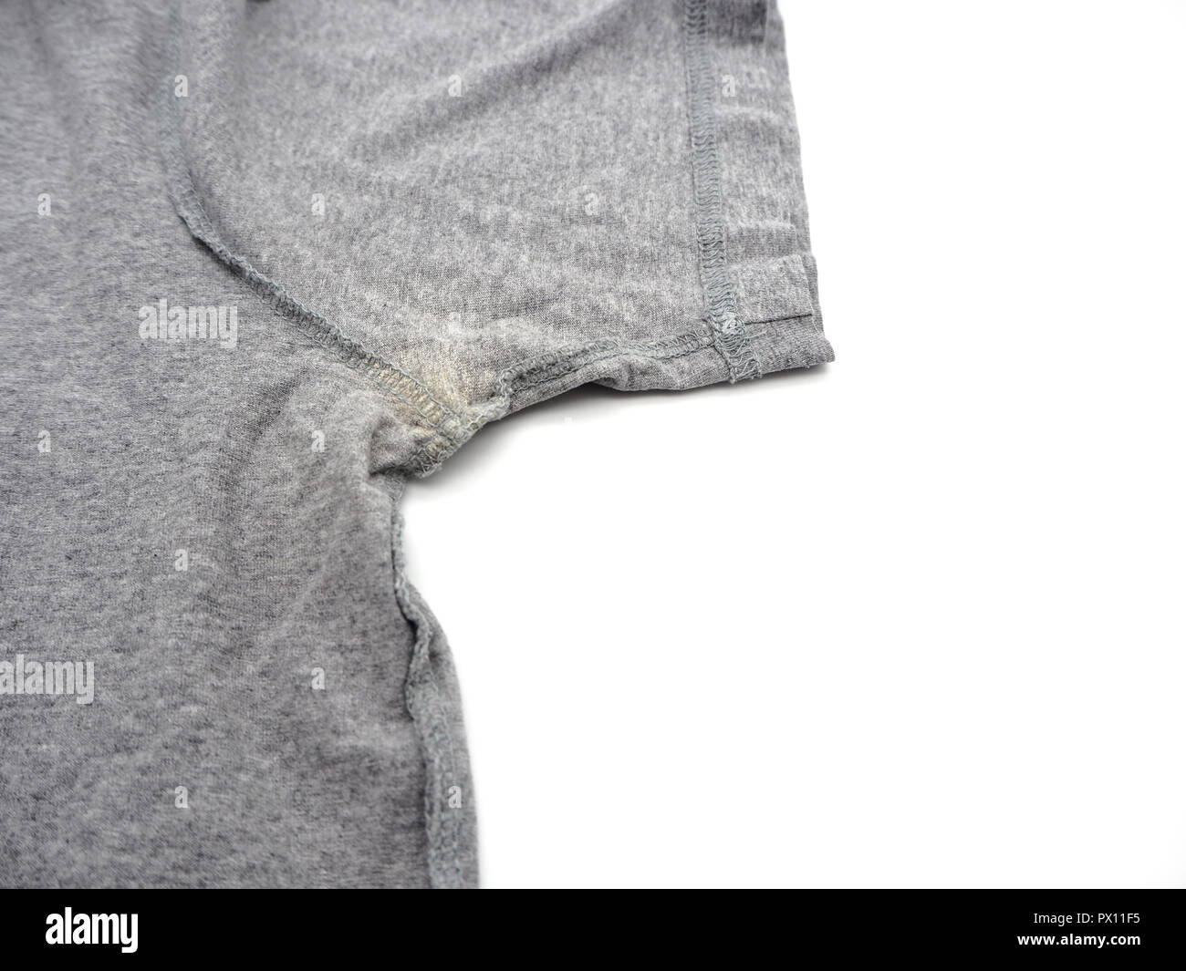 Yellow stain under armpit on Tshirt isolated on white background Stock