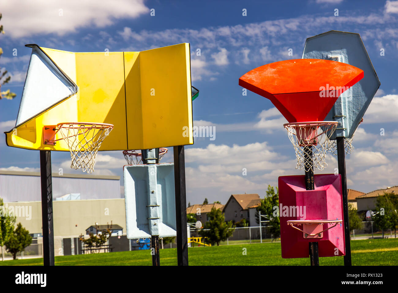 Various Height Modern Basketball Hoops At Children's Playground Stock