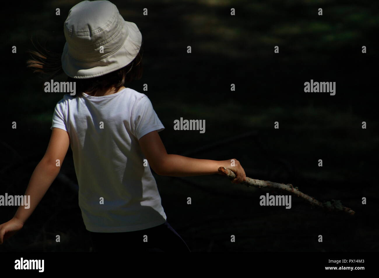 let the children play with a stick Stock Photo