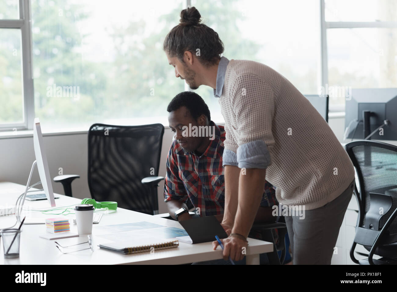 Businessmen working together in the office Stock Photo