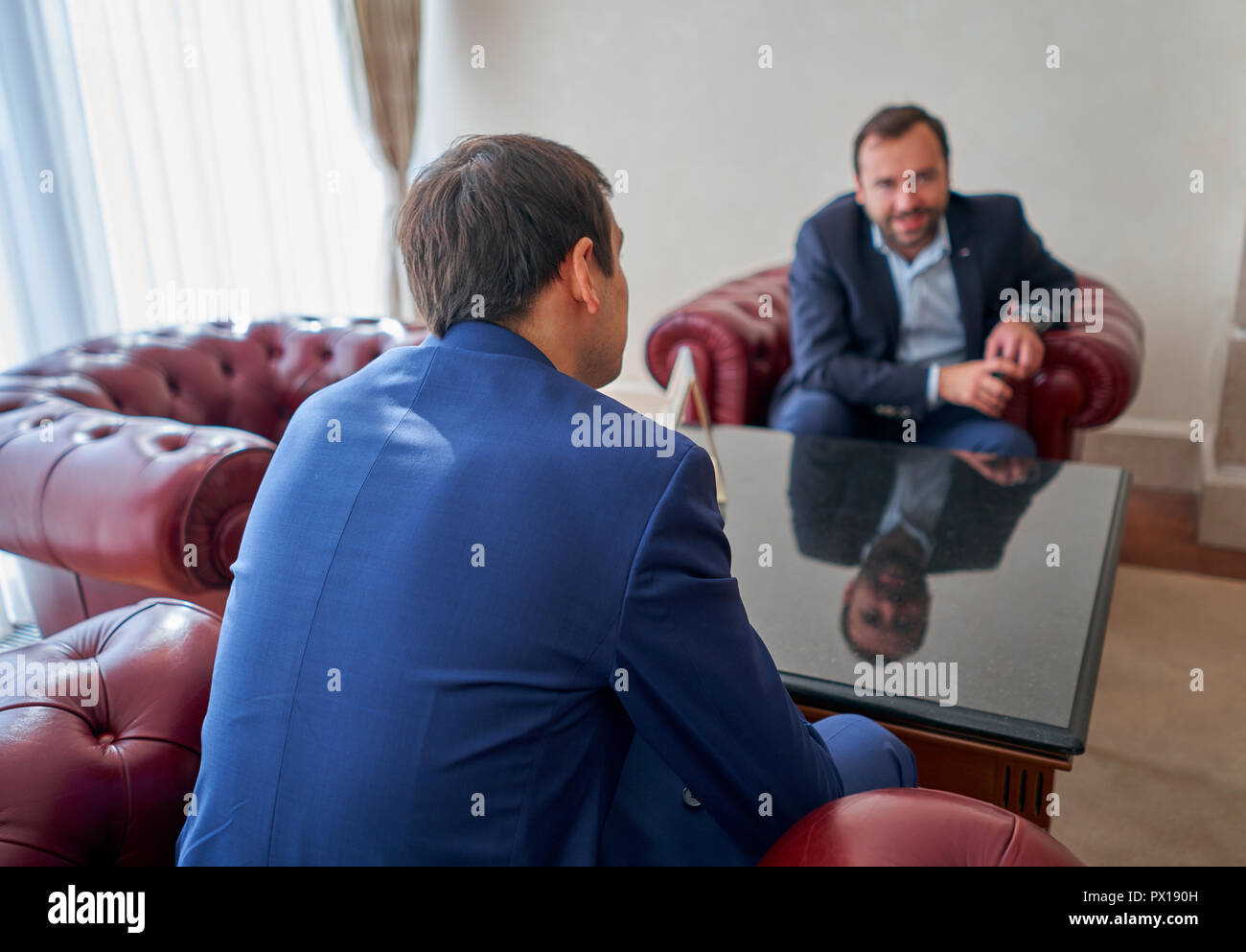 Group of businessmen suits hi-res stock photography and images - Alamy