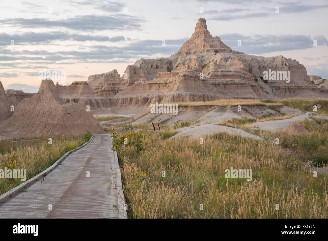 BadLands mountains on a Beautiful cloudy day. With Board walk leading to Mountains. Stock Photo