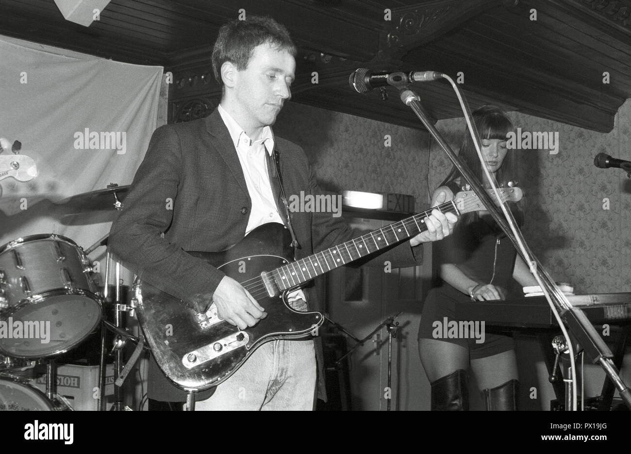Gerard "Caesar" McInulty and Carolyn Allen from post-punk/indie pop band  The Wake performing at Esquires, Bedford, 1990 Stock Photo - Alamy