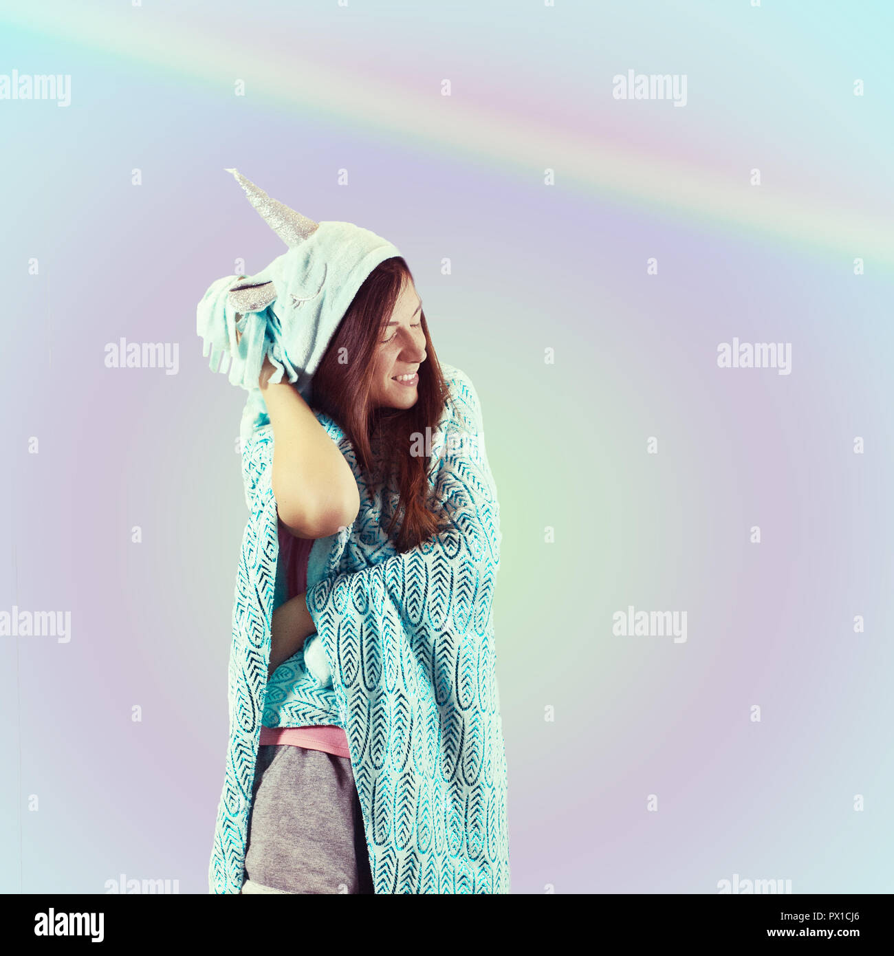 Girl in pajamas Unicorn. Candy party style Stock Photo