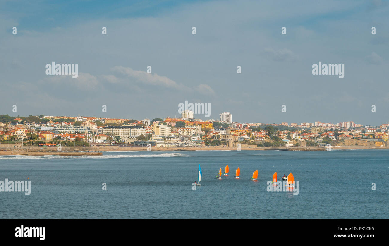 Wind sailing boats off the coast of Estoril near Lisbon, Portugal on a sunny day Stock Photo