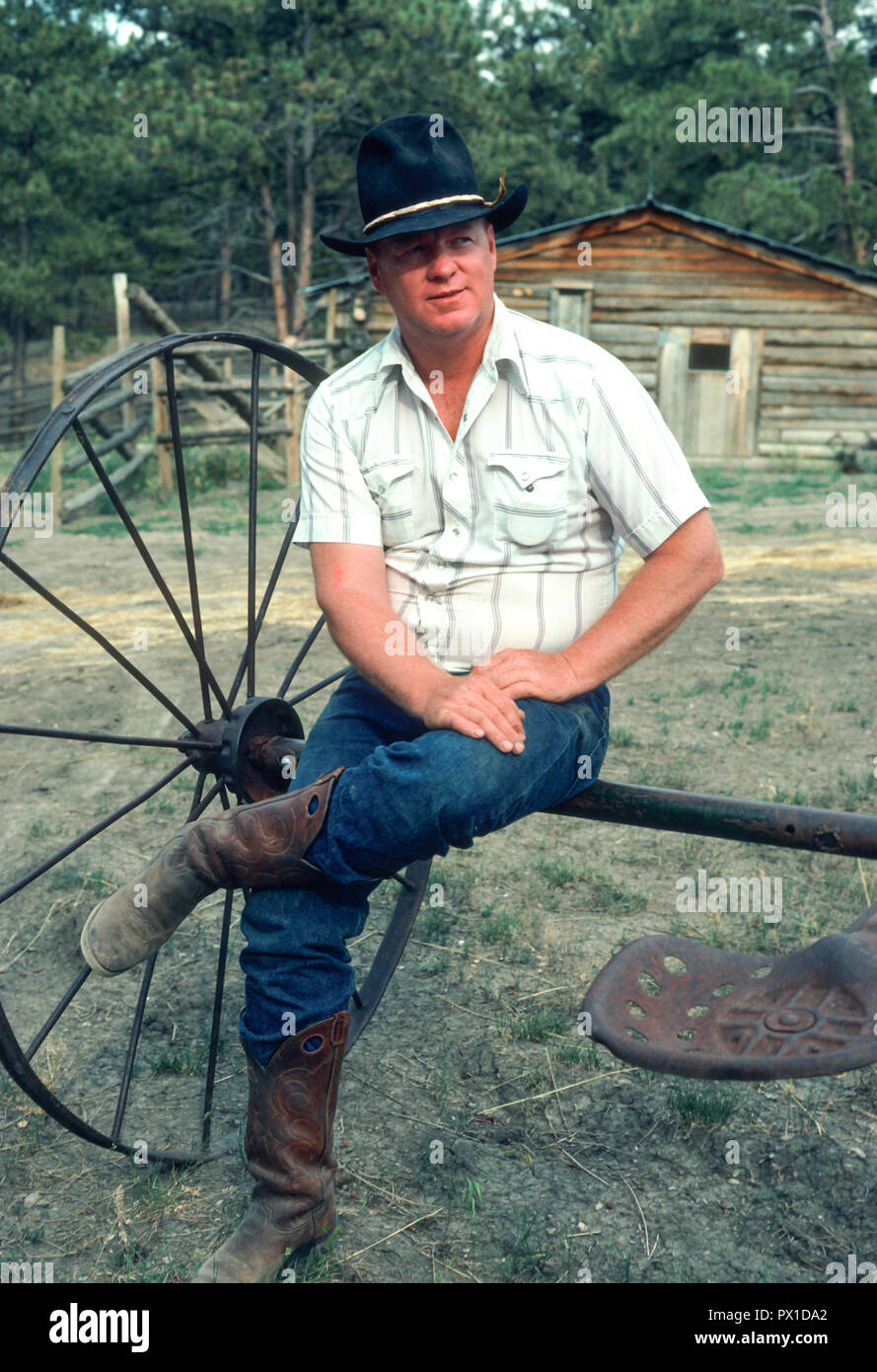 Cowboy relaxes outside his bunkhouse, South Dakota, USA Stock Photo - Alamy