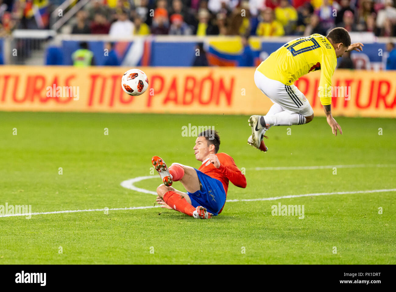 Harrison, NJ - October 16, 2018: Juan Fernando Quintero (20) of Colombia jumps over during the friendly soccer game between Costa Rica & Colombia at Red Bull Arena Colombia won 3 - 1 Stock Photo