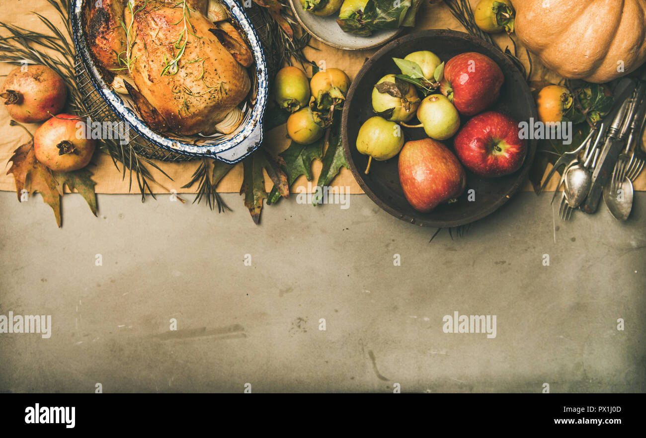 Thanksgiving dinner table setting with roasted chicken or turkey Stock