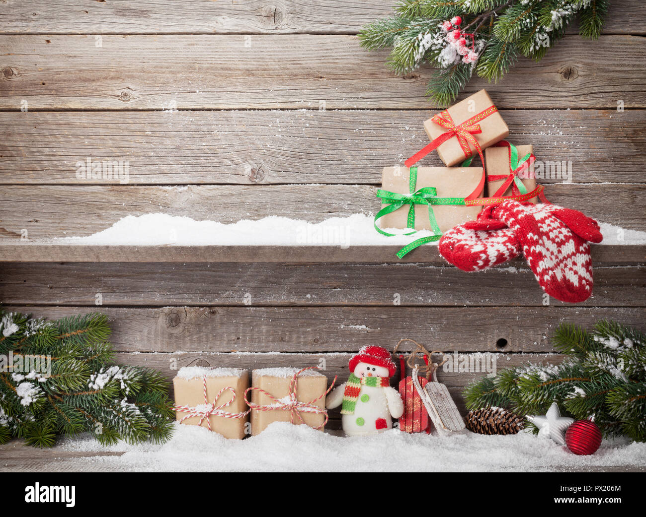 Christmas gift boxes and xmas fir tree branch. View with space for your ...