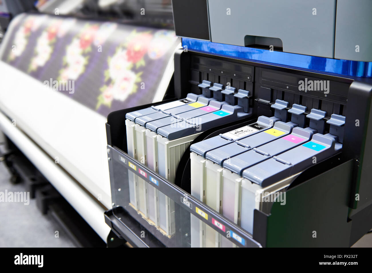 Color ink cartridge in the inkjet plotter printer Stock Photo