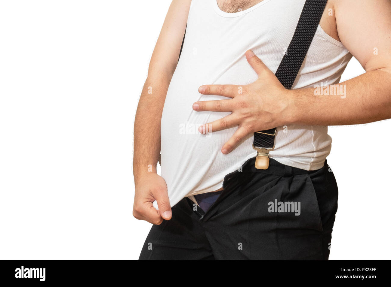 A man embraces his big belly with one hand, and the other pulls on his jersey showing his size. A man's big belly, as if to say it's time to lose weig Stock Photo