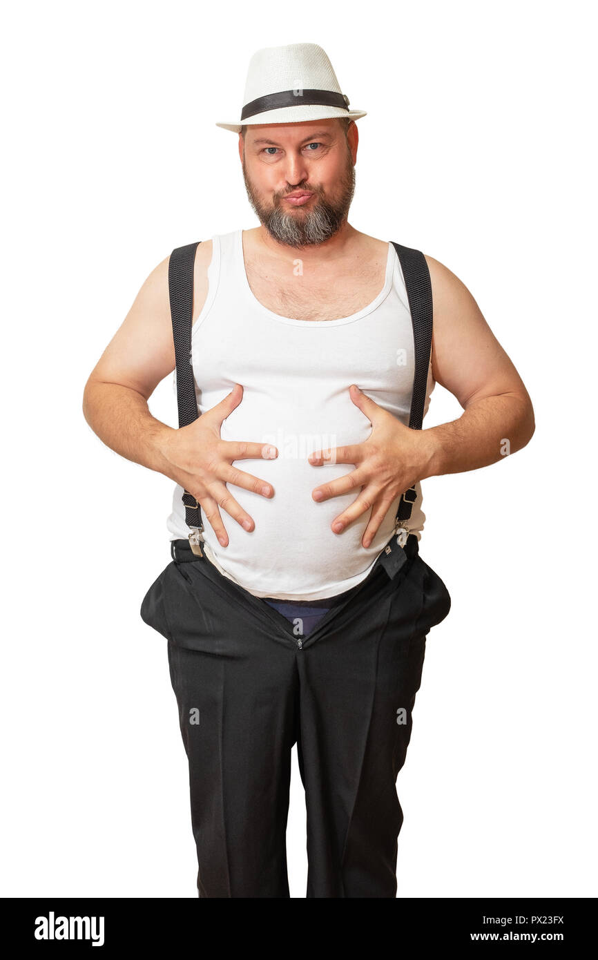 A man with a big belly shows his size with his hands. A man's big belly, as if to say it's time to lose weight. A man embraces his big belly. Stock Photo