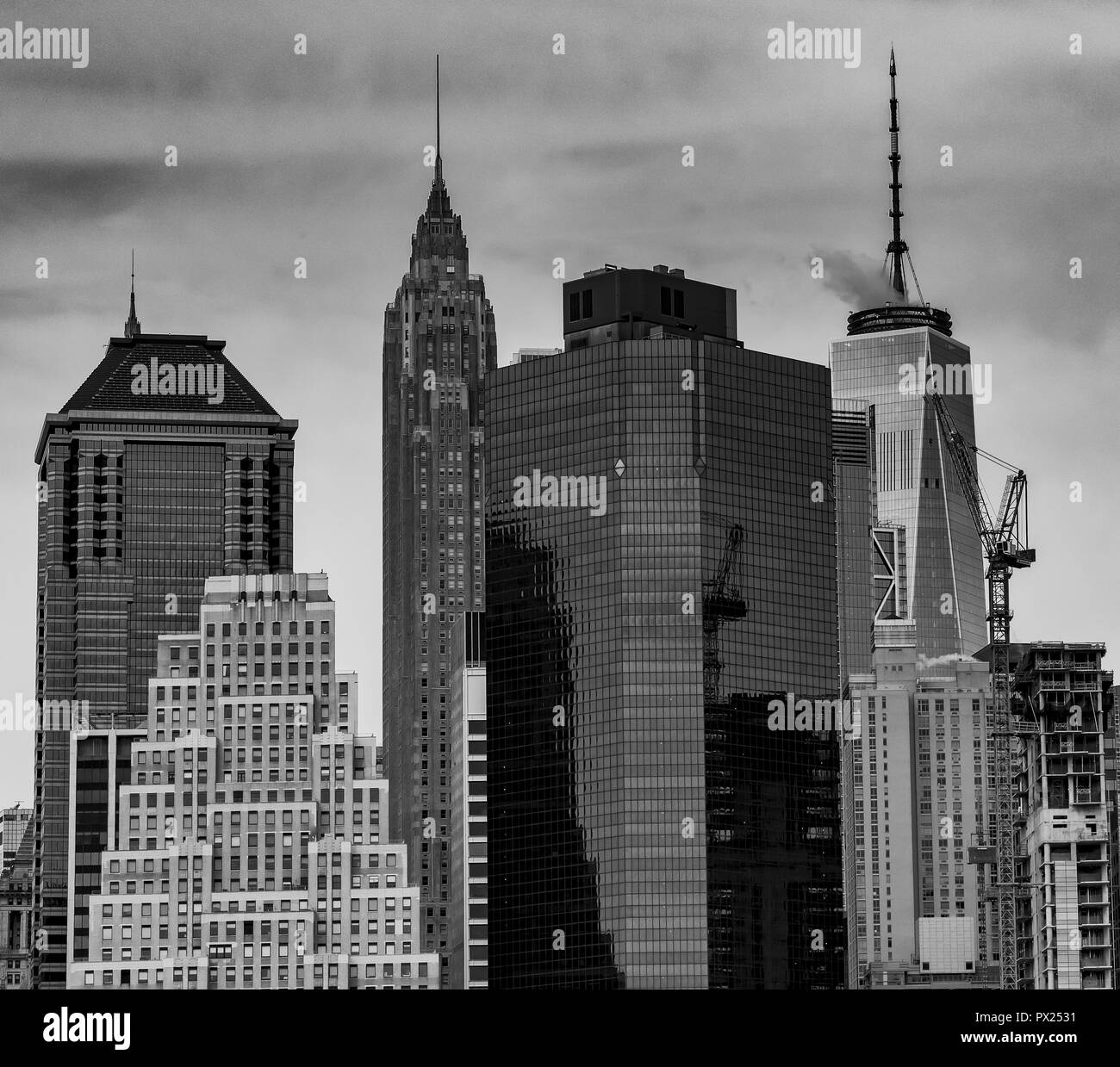 Black and white capture of the NYC Skyline. New York New York city Skyline from Brooklyn Bridge Park. Stock Photo