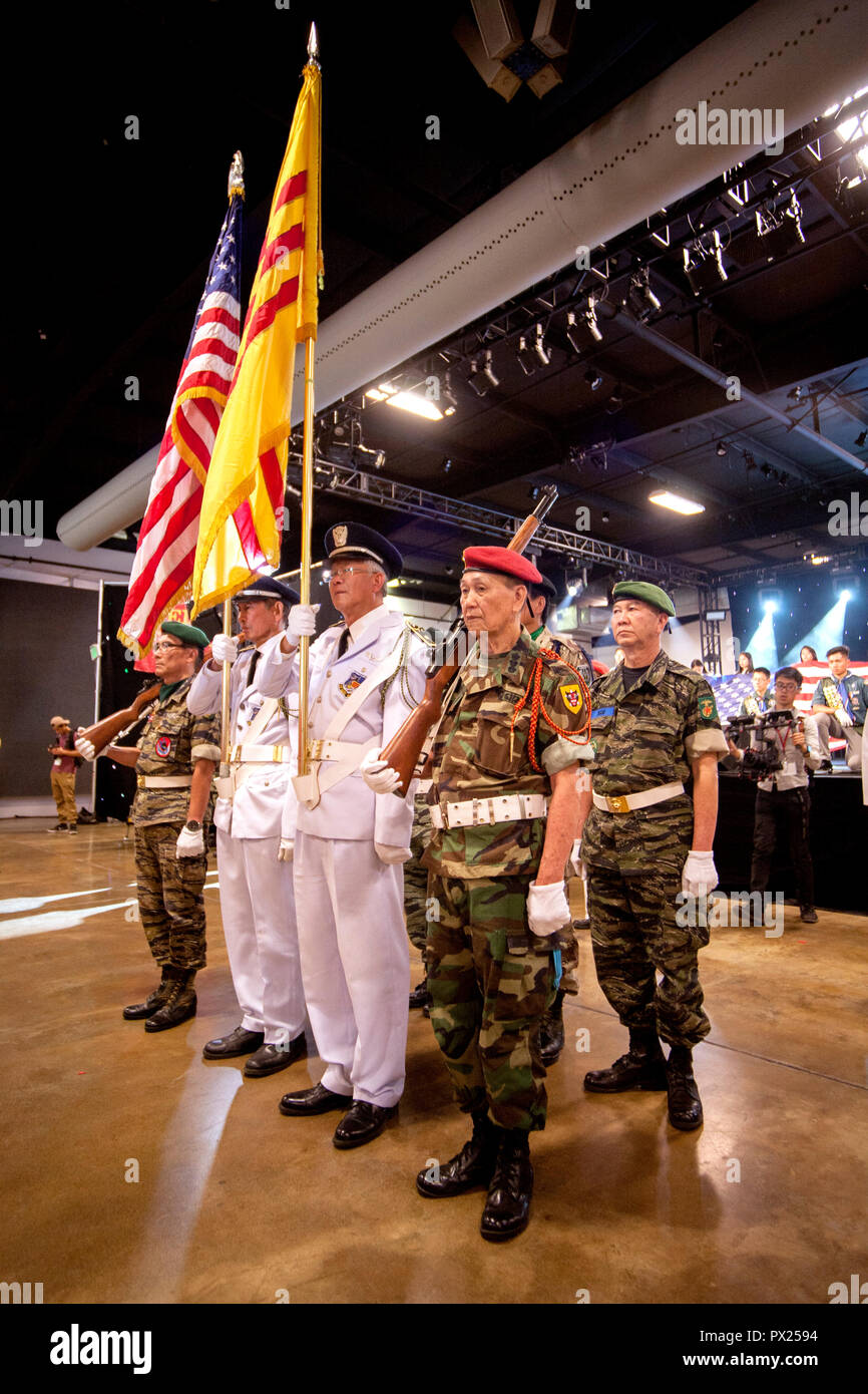 Carrying Vietnamese and American flags, an honor guard of former South Vietnamese soldiers keynotes an Asian American cultural festival in Costa Mesa, CA. Stock Photo