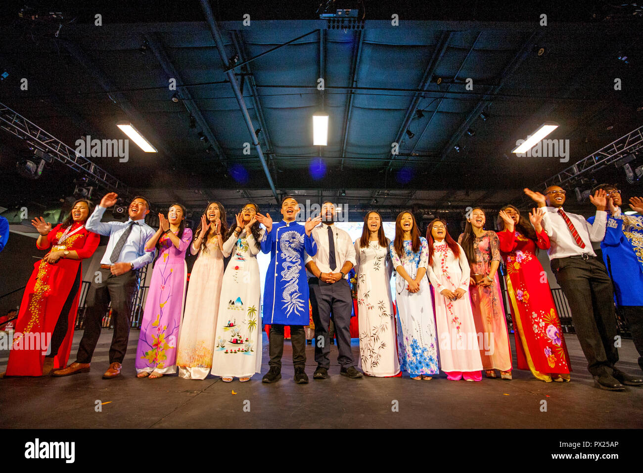 Vietnamese American young adults wear traditional costumes as they