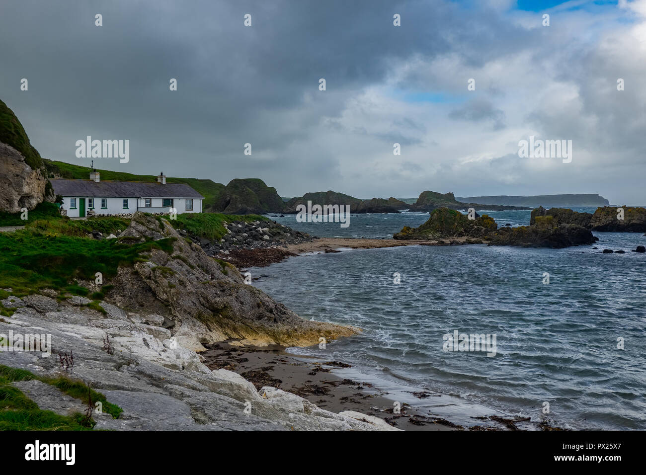 Ballintoy Harbour and Village are located alongside the B15 coast road, 17 miles north-east of Coleraine and five miles west of Ballycastle, Northetn  Stock Photo