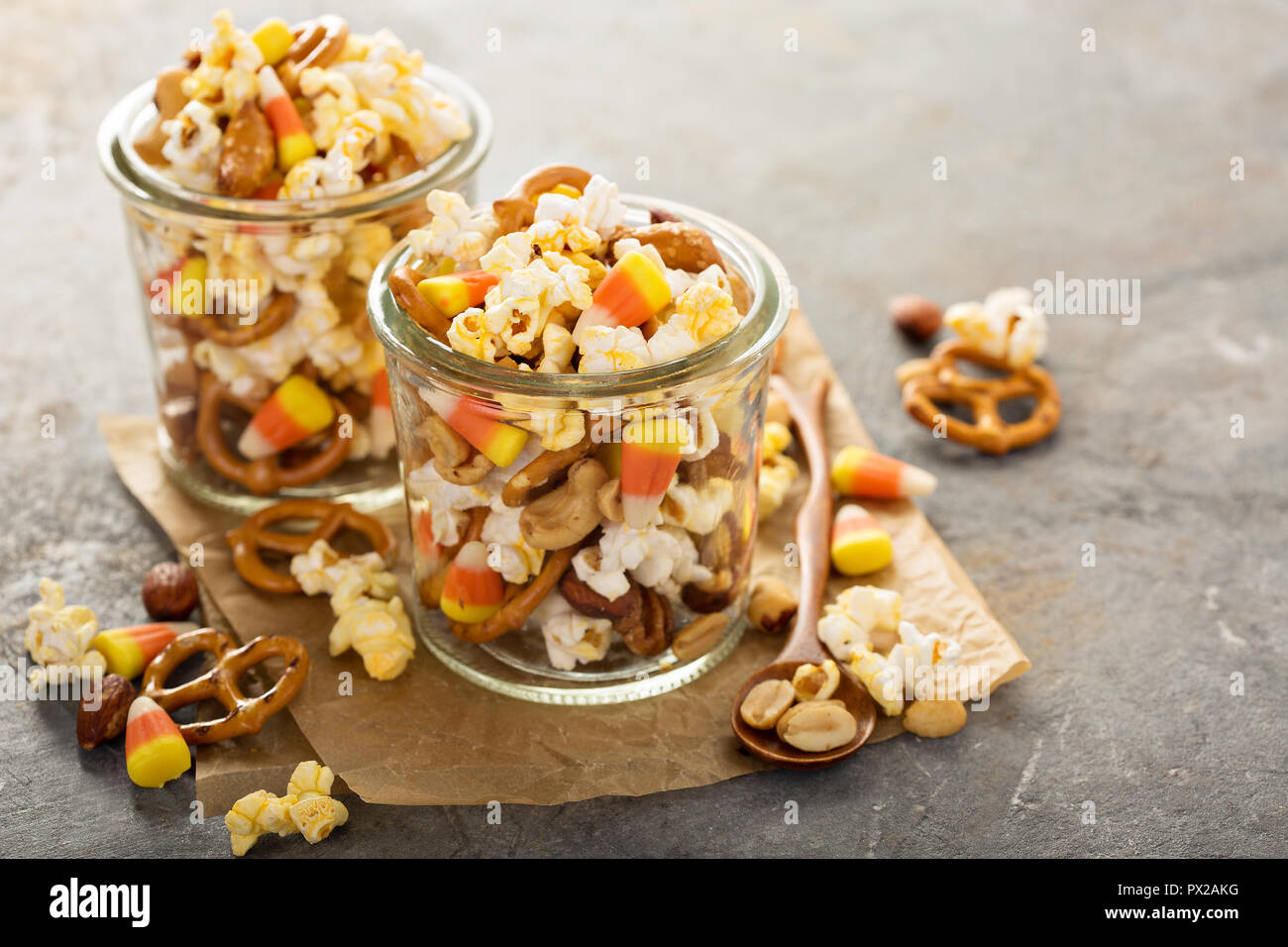 Homemade Halloween trail mix with candy corn, popcorn and pretzels