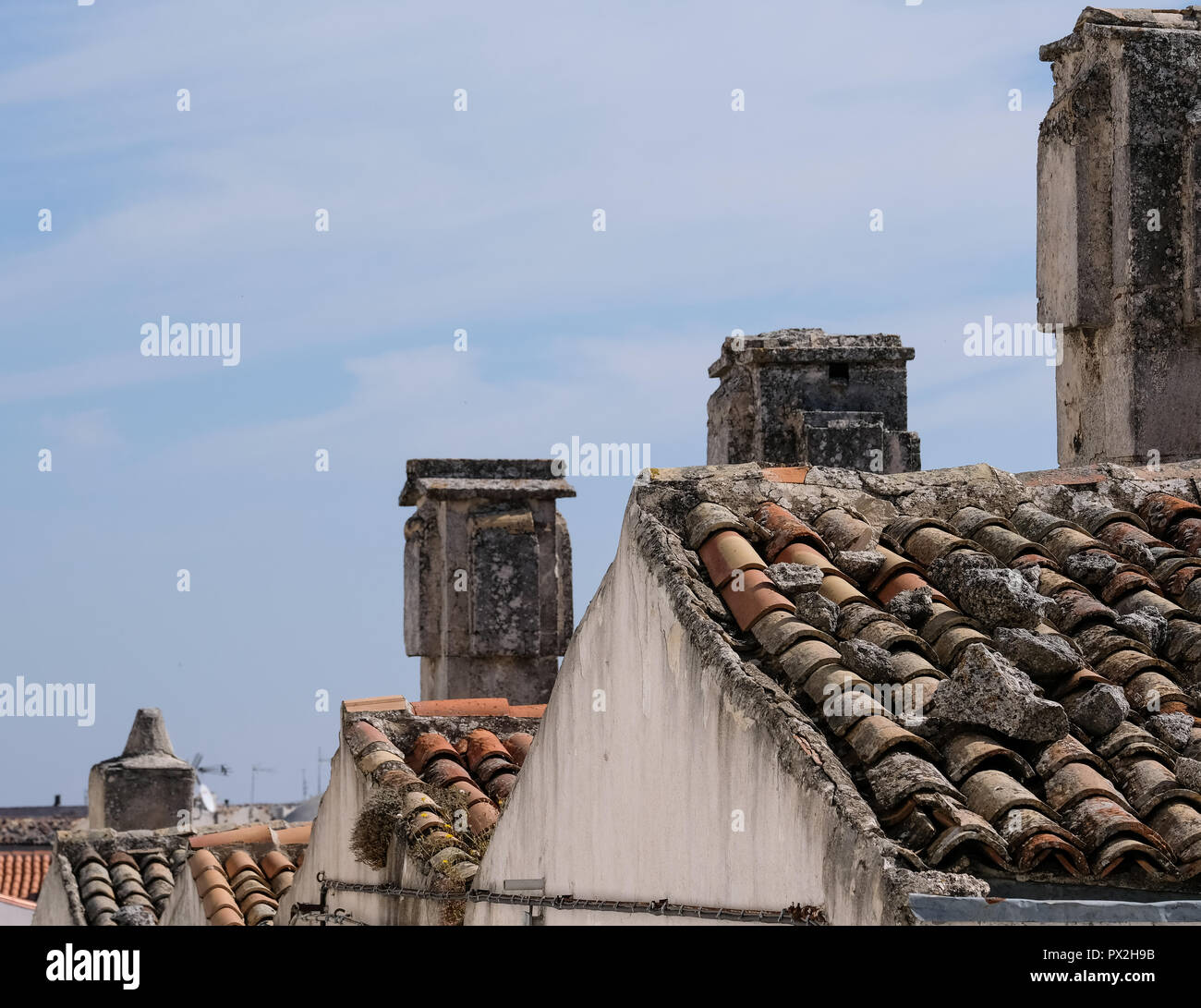 Roof top scene with red roof tiles in Monte Sant'Angelo, hilltop town in Puglia, southern Italy. Stock Photo