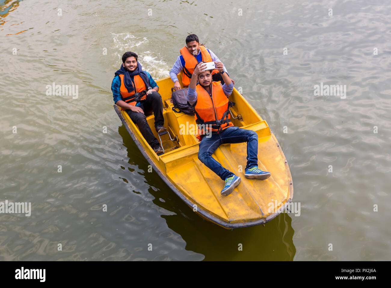 Man taking a selfie on a boating lake, Ward's Lake, Shillong, Meghalaya, India Stock Photo