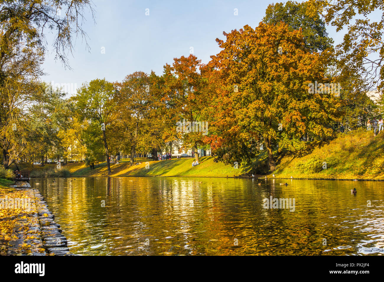 Fall In Riga City canal in Riga in fall on a sunny day Stock Photo - Alamy