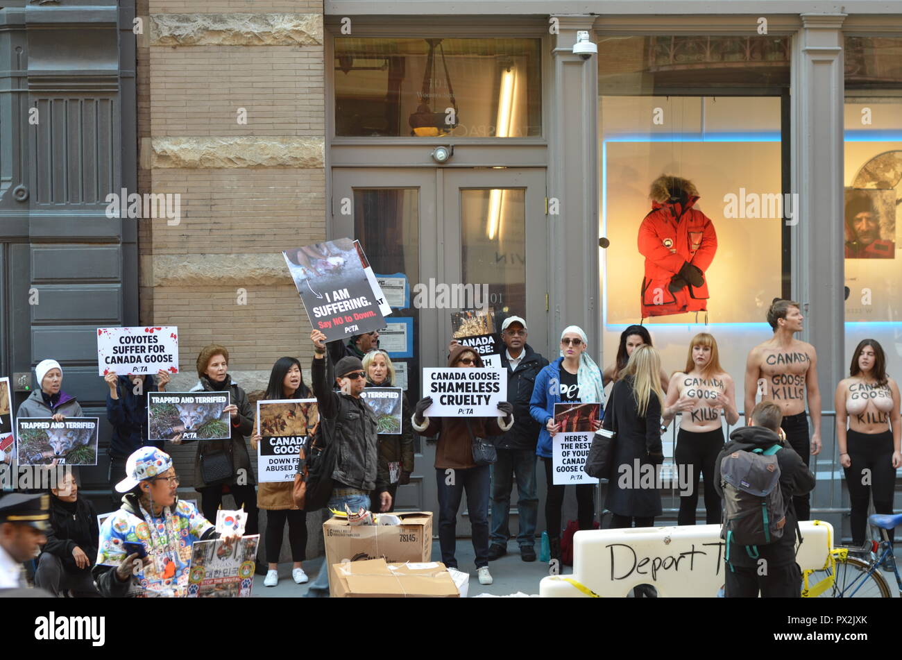 Manhattan, United States. 18th Oct, 2018. Today animal-rights protesters  showed up outside the new Canada Goose store in Soho, New York City. As  temperatures drop, and New Yorkers start shopping for winter