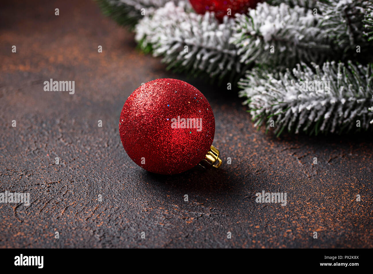 Christmas background with branch of tree and red balls Stock Photo - Alamy