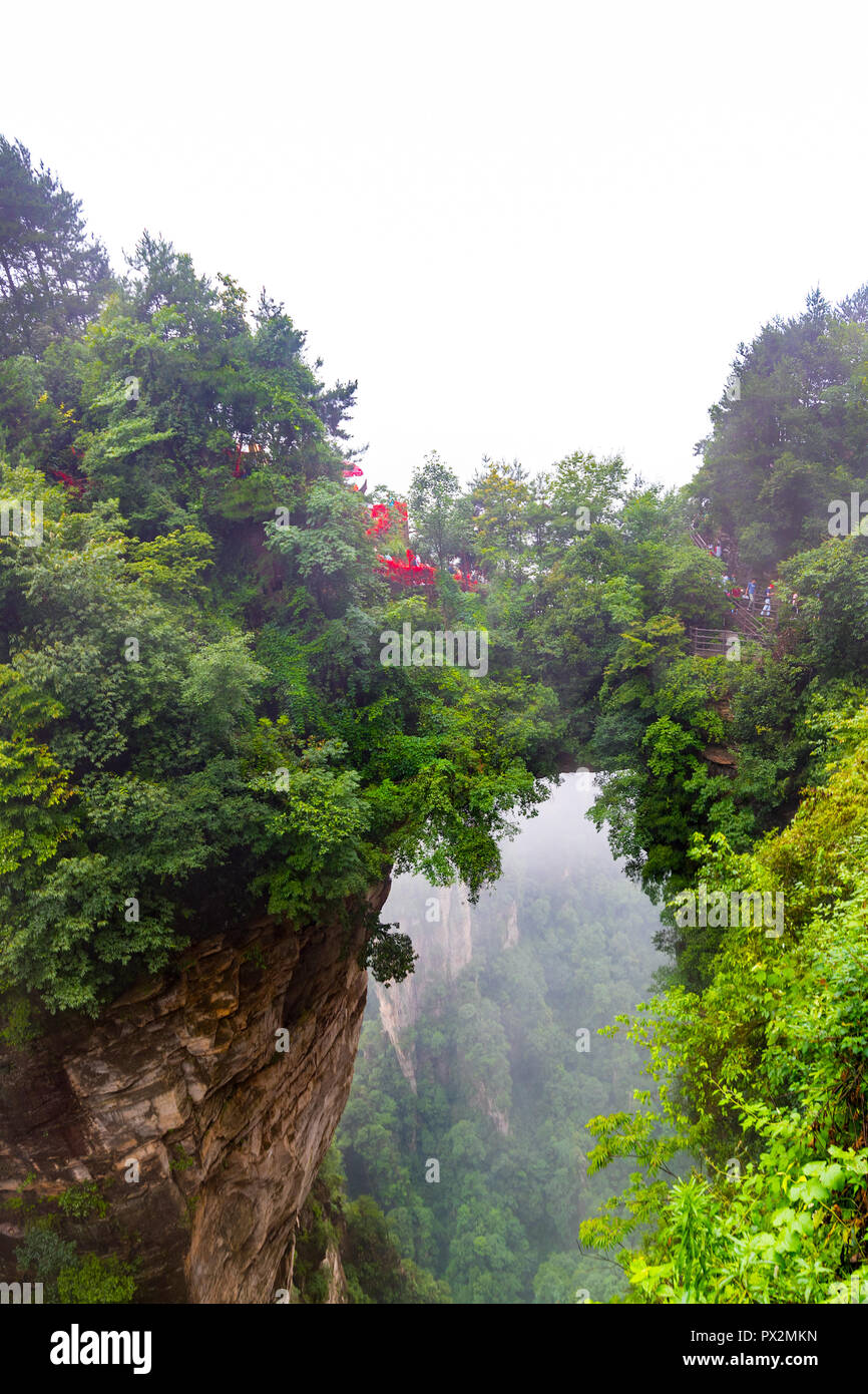 The First Bridge of the World, or Tian Xia Di Yi Qiao, is a natural rock bridge in Zhangjiajie Natural Reserve, Hunan, China. Stock Photo