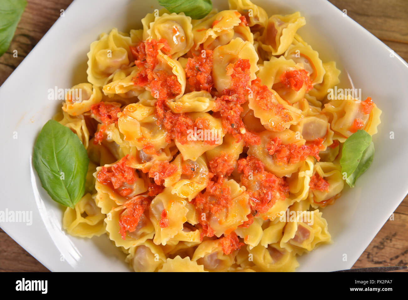 tortellini with sauce traditional italian food Stock Photo Alamy