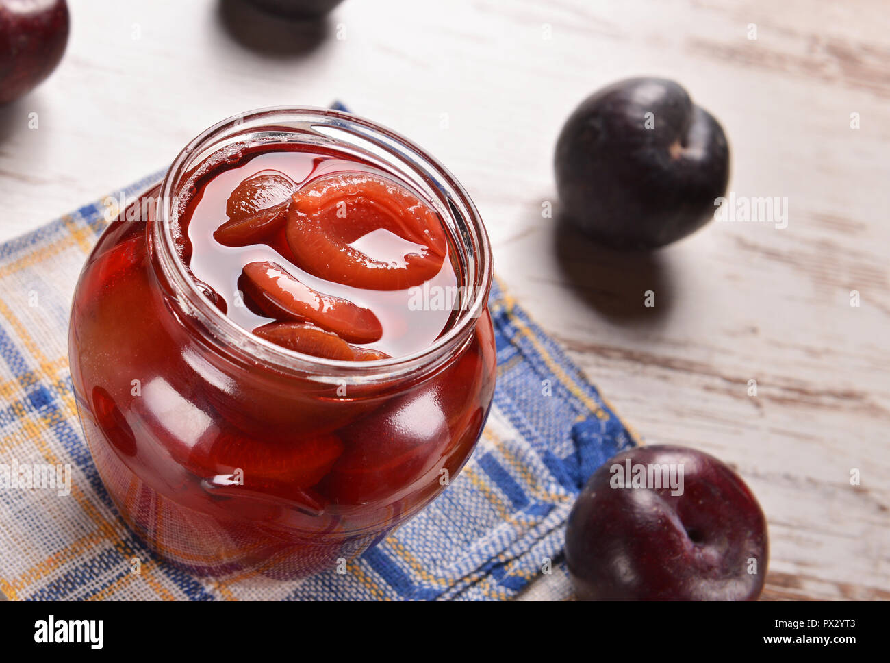 Fresh plums in the jar Stock Photo Alamy