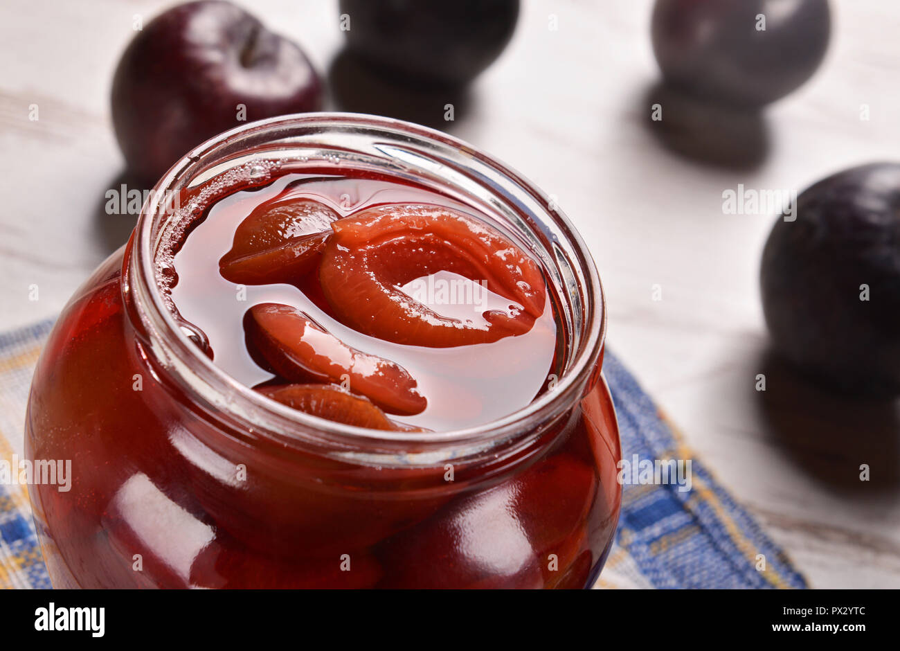 Fresh plums in the jar Stock Photo Alamy