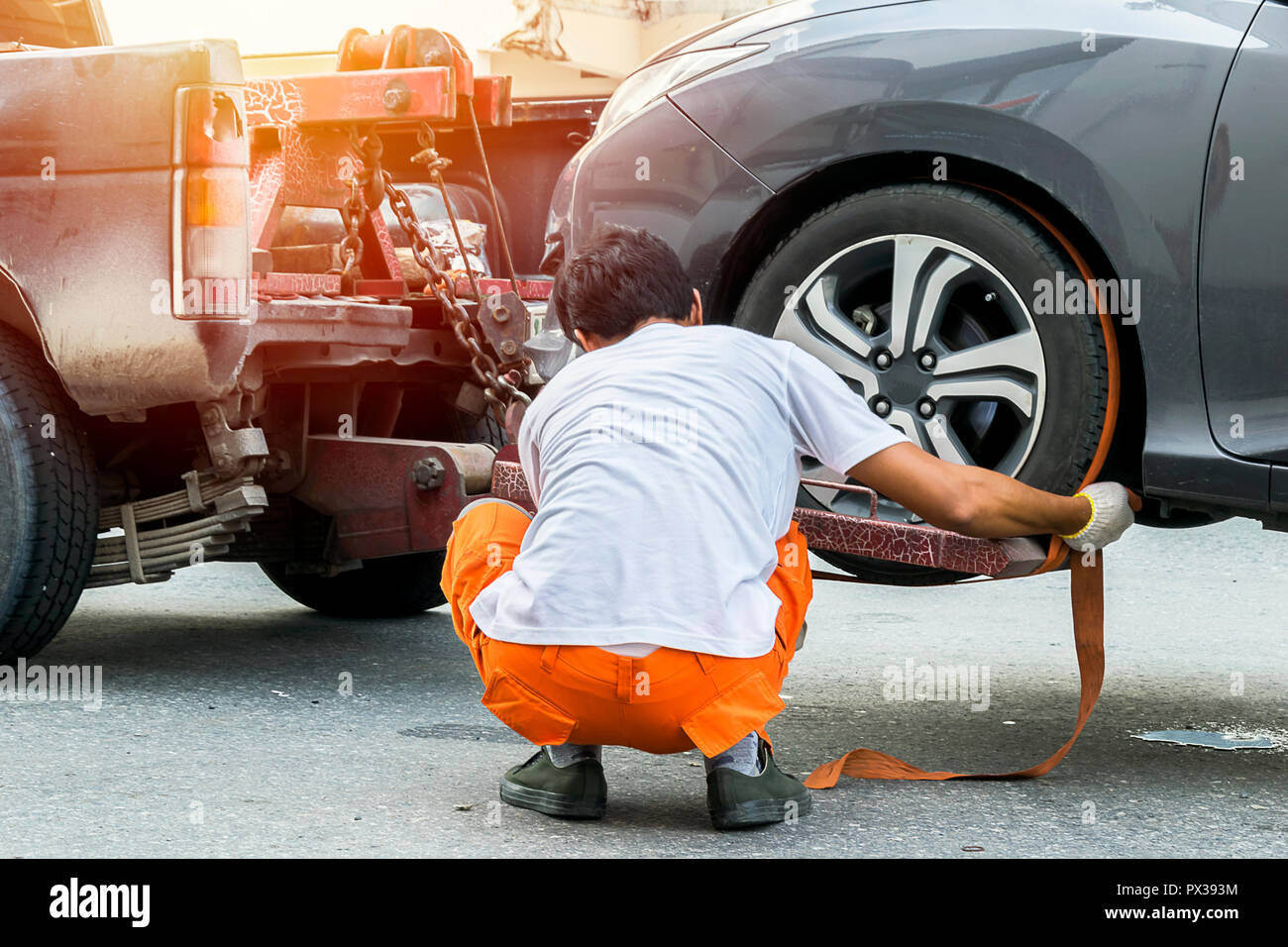 Traveling by car is a major vehicle, the car can not be used and repair is moving, Hire a mechanic to pull the car. To repair the maintenance center. Stock Photo