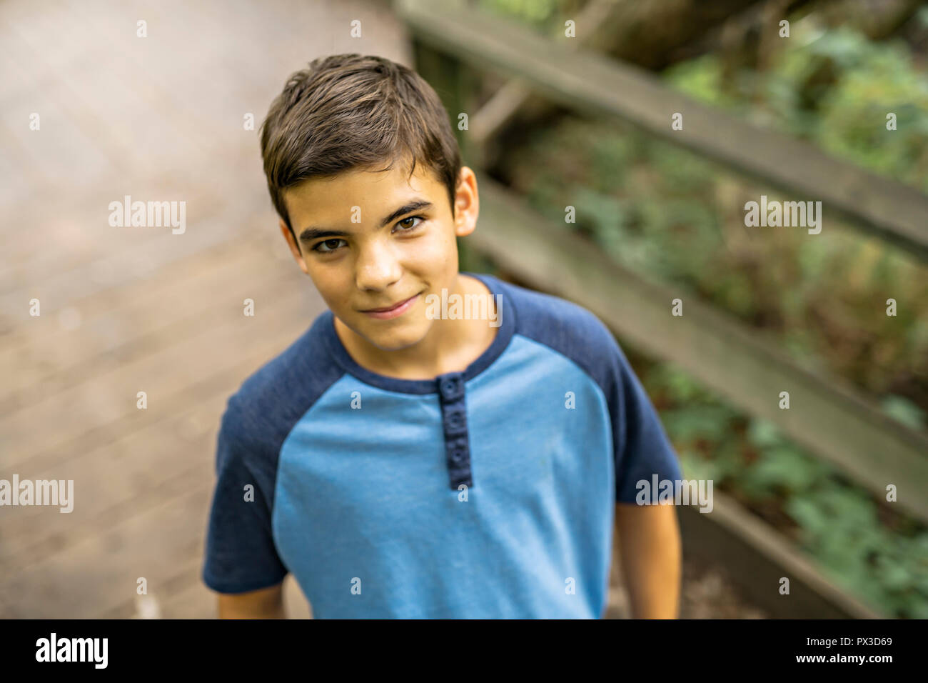 Portrait of a boy outdoors in the forest Stock Photo - Alamy