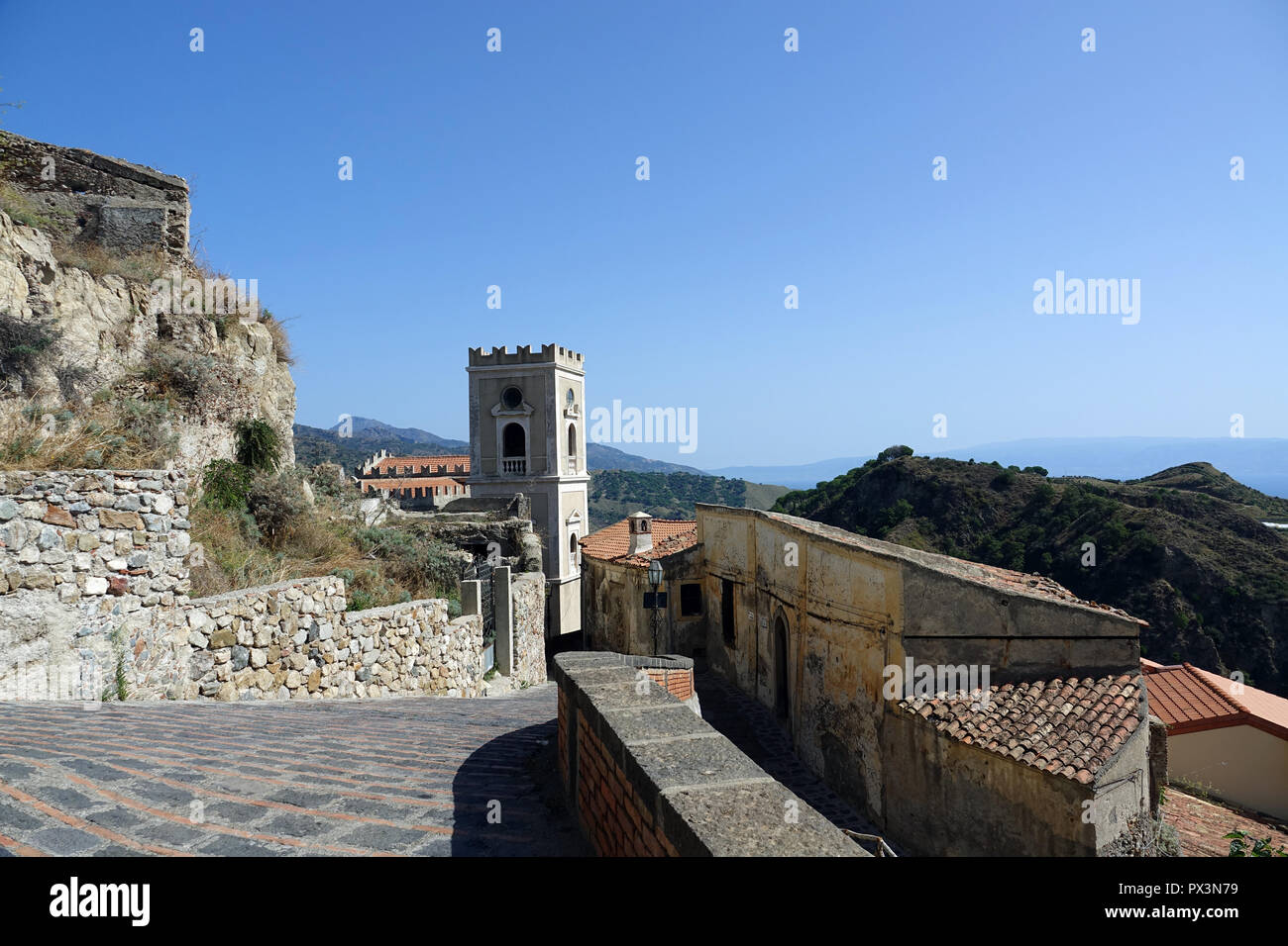 Savoca, Italy. 05th Sep, 2018. 05 September 2018, Italy, Savoca: View to the Sicilian village Savoca and church St. Nicolo (back) from the 16th century. The church is also called Santa Lucia. The village has been known since 1415. Savoca was the location for several scenes of the film trilogy The Godfather. Credit: Alexandra Schuler/dpa/Alamy Live News Stock Photo
