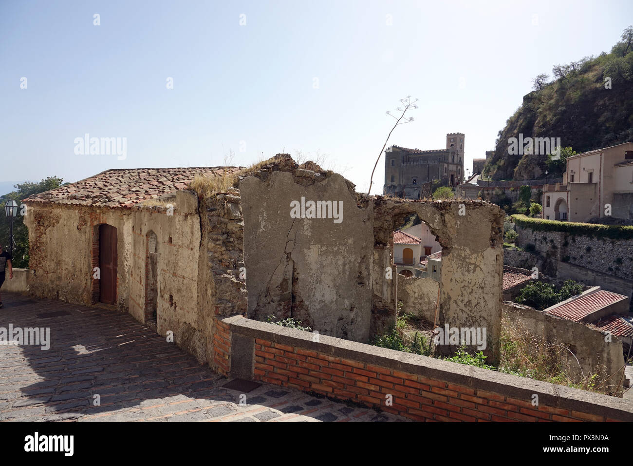 Savoca, Italy. 05th Sep, 2018. 05 September 2018, Italy, Savoca: View to the Sicilian village Savoca and church St. Nicolo (back) from the 16th century. The church is also called Santa Lucia. The village has been known since 1415. Savoca was the location for several scenes of the film trilogy The Godfather. Credit: Alexandra Schuler/dpa/Alamy Live News Stock Photo
