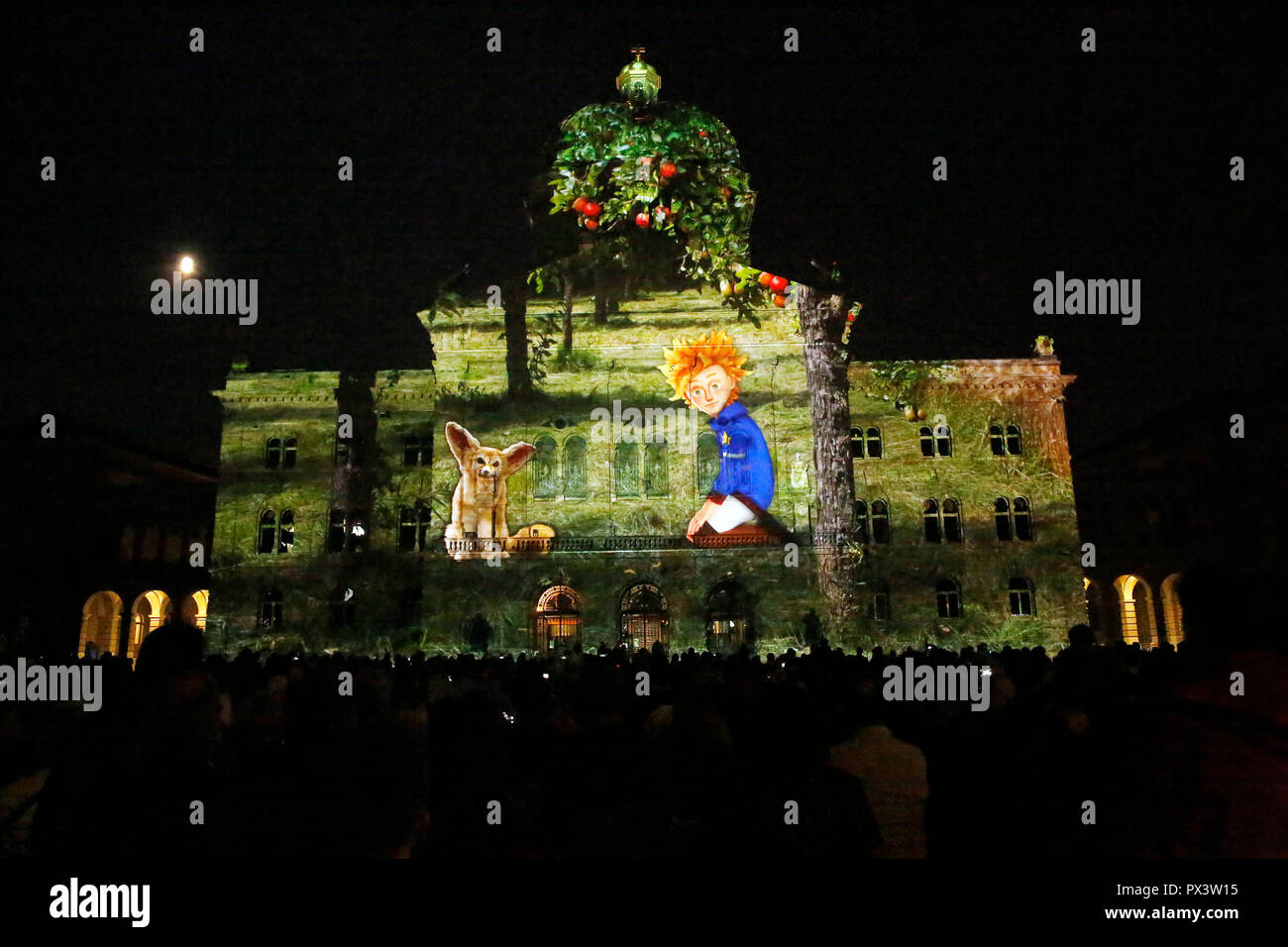 Bern. 19th Oct, 2018. Photo taken on Oct. 19, 2018 shows the light show Rendez-vous Bundesplatz in front of the Swiss Parliament Building in Bern, Switzerland. The annual light show, which will last till Nov. 24, shows the world-famous novella 'The Little Prince' by Antoine de Saint-Exupery this year. Credit: Ruben Sprich/Xinhua/Alamy Live News Stock Photo