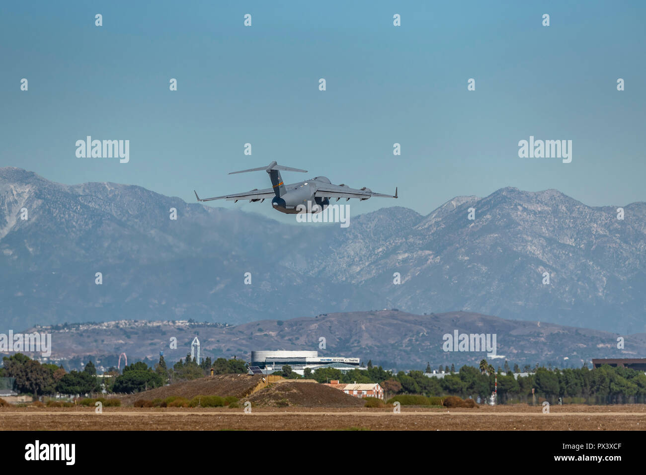 Los Alamitos, CA. USAF C17 Globemaster III takes off through the heat