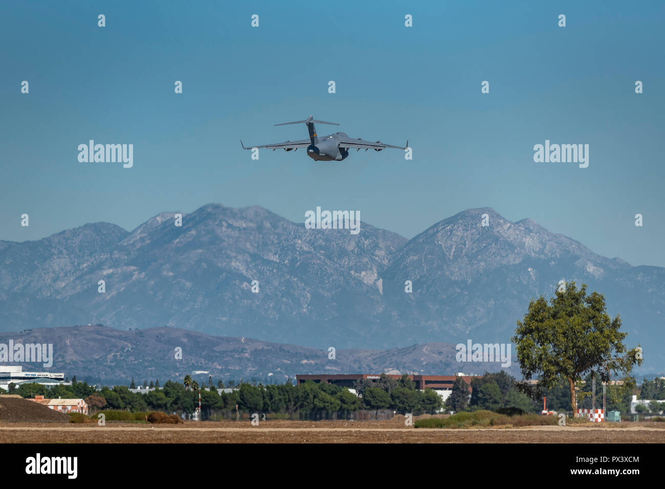 Los Alamitos, CA. USAF C17 Globemaster III takes off through the heat