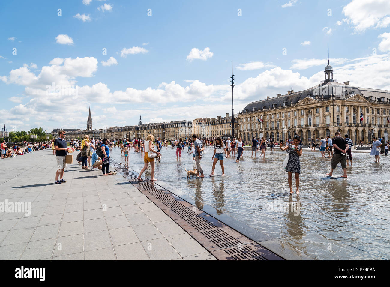 Bordeaux, France - July 22, 2018: People enjoying on The Water Mirror.  Located across from Place de la Bourse, this pool alternates a mirror  effect an Stock Photo - Alamy