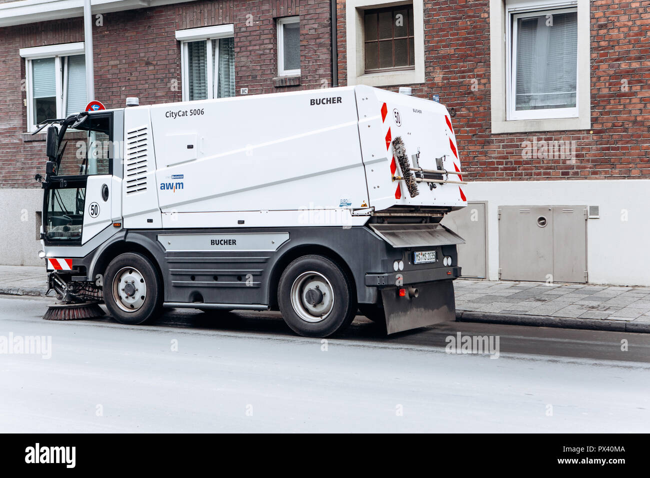 Germany, Muenster, October 5, 2018: A special truck or street cleaning  vehicle rides along the road and cleans the street from dirt and dust Stock  Photo - Alamy