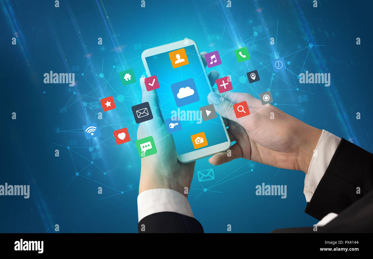 Female hand using smartphone with colorful application icons around ...