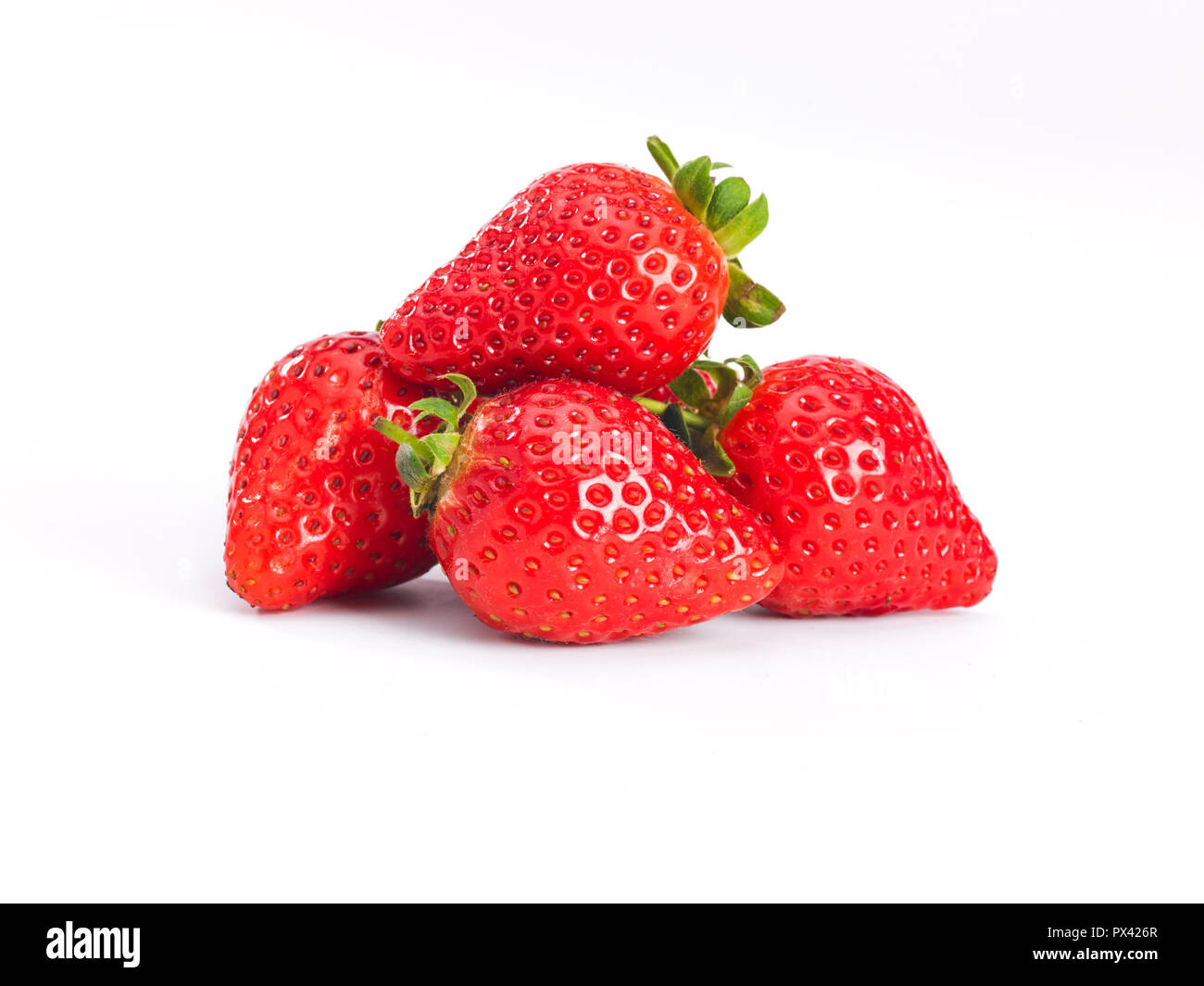 a pile of strawberrys on a white background Stock Photo