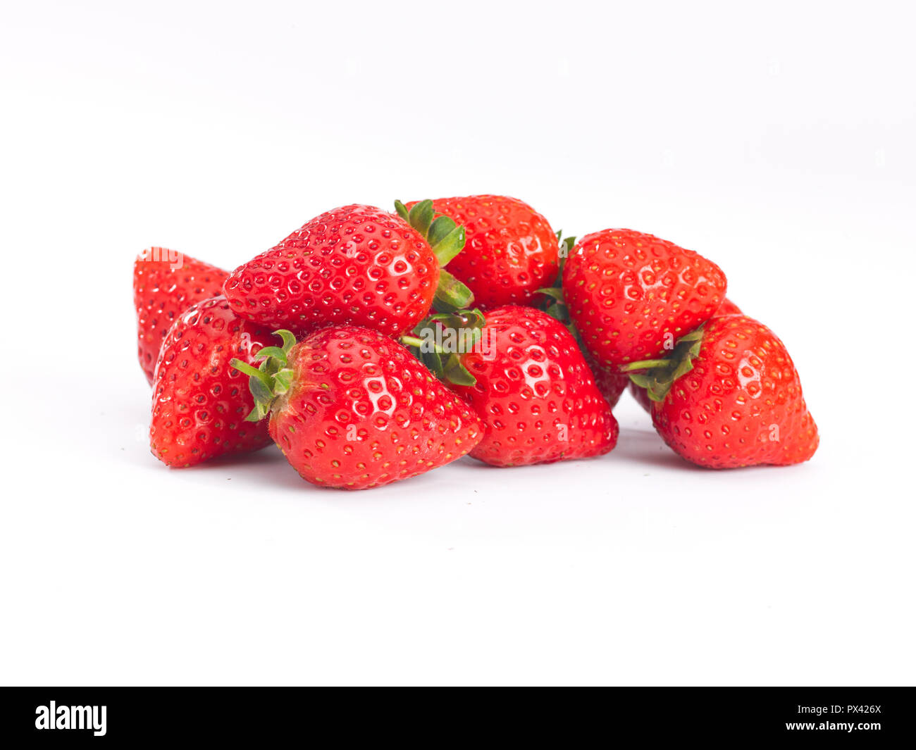 a pile of strawberrys on a white background Stock Photo